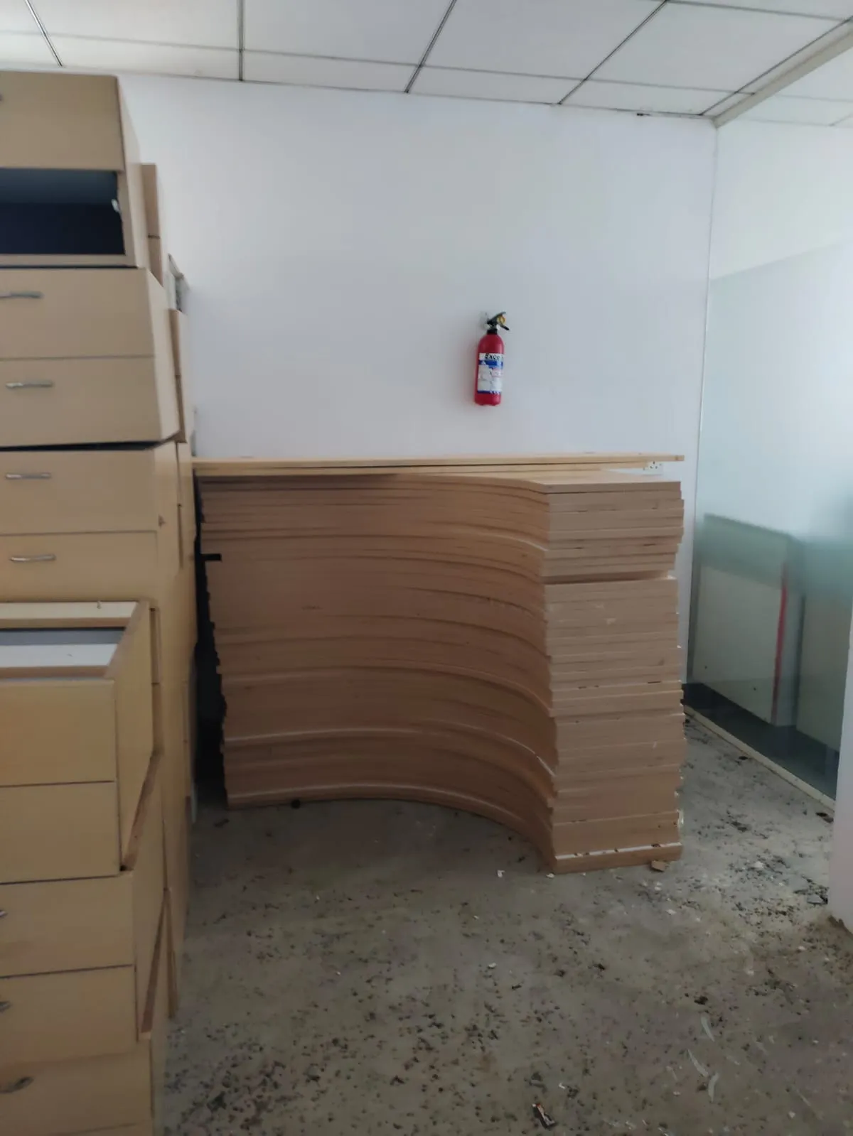 Disassembled corporate workstations flat-packed carefully during an office furniture dismantling Perungudi assignment.